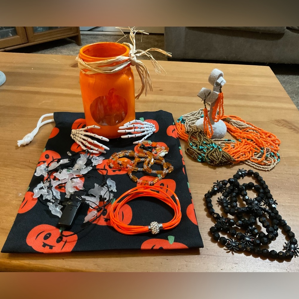 Halloween Jar full of Halloween goodie’s. From skeleton hand clips to necklaces.